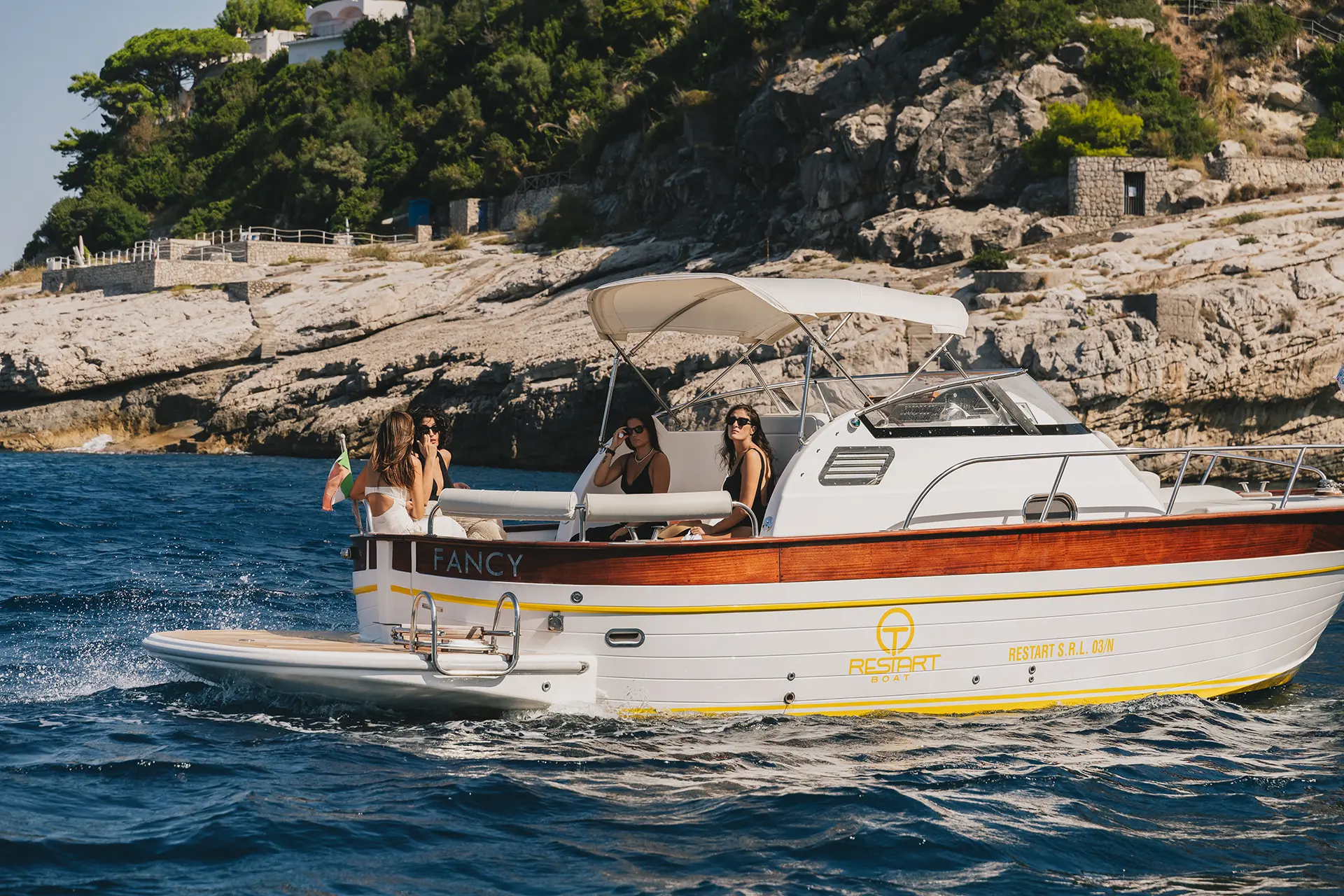 Relaxing on the stern of the Acquamarine 850 while cruising
