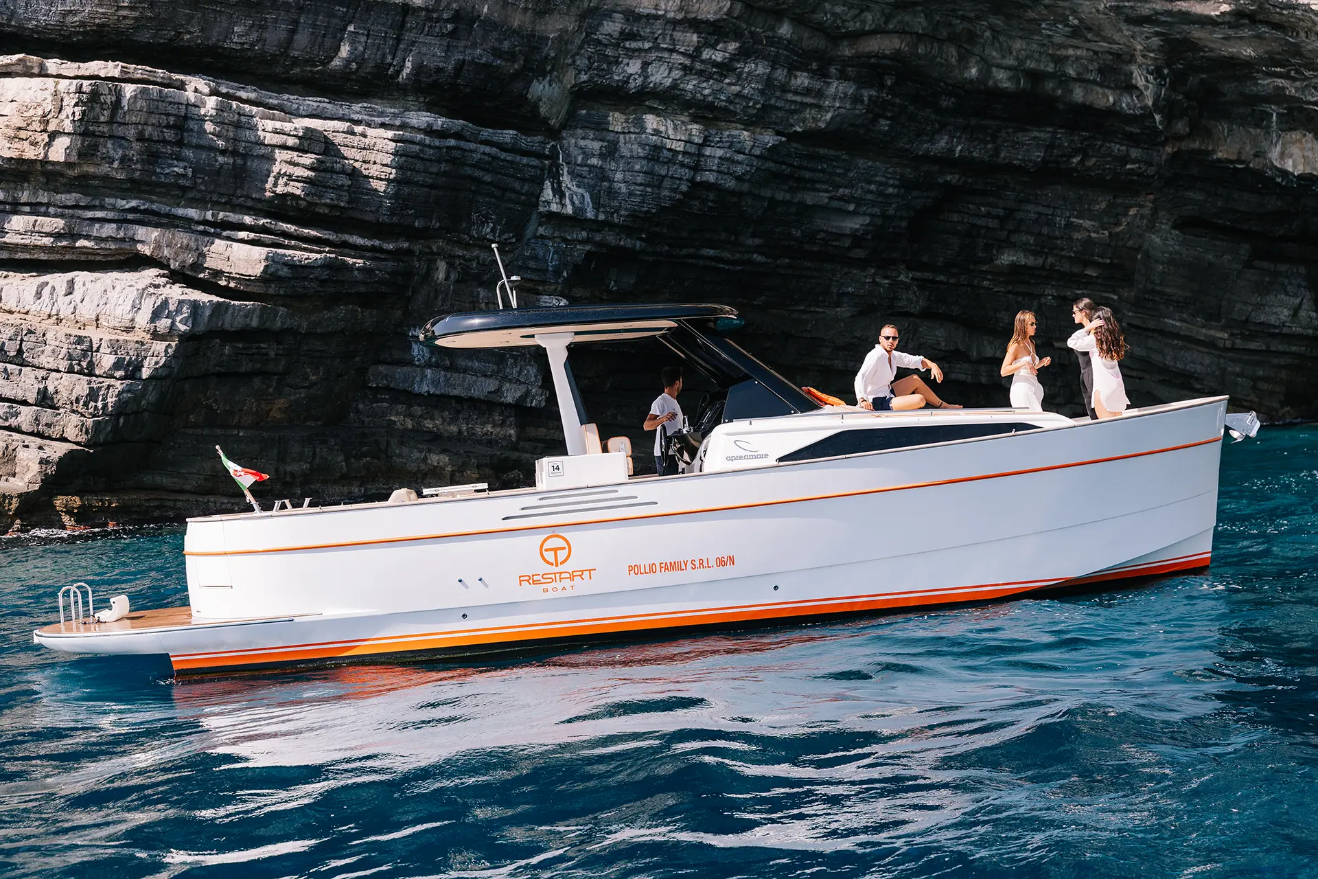 Relaxing on the bow of the Apreamare 35 while cruising
