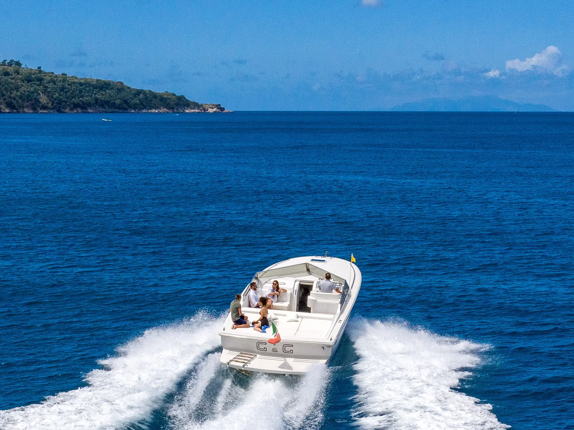 Panoramic cruising of the Tornado 38 over turquoise waters